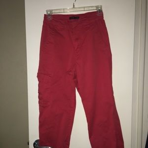 Red pants with cuffs at the bottom